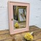 Small pink bathroom cabinet
