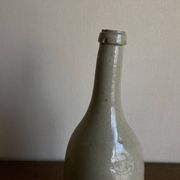 Bouteille de grès penchée début 20e