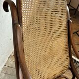 Thonet rocking chair in curved wood and cane from the 1900s