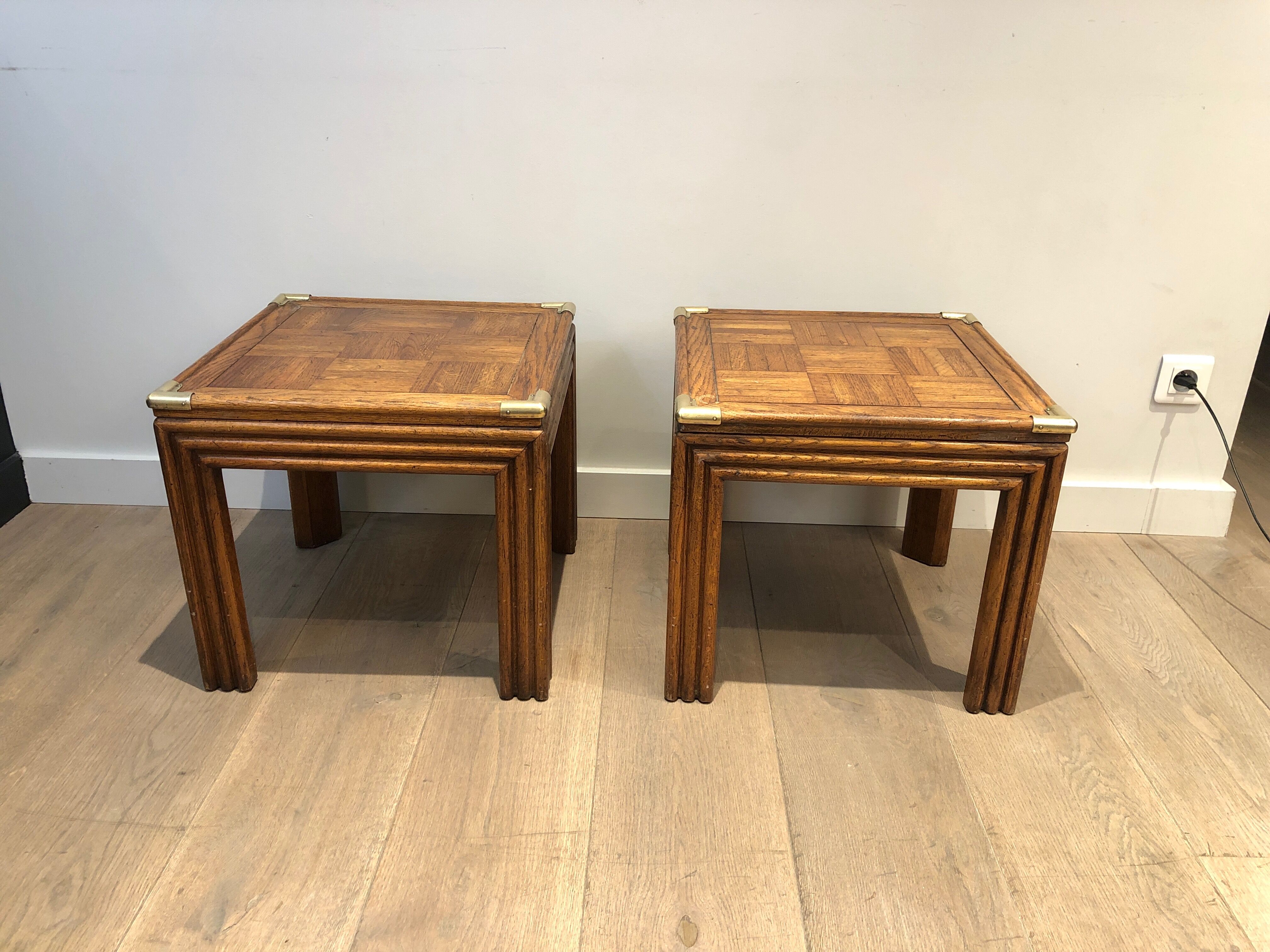 Pair of wooden and brass sofa ends