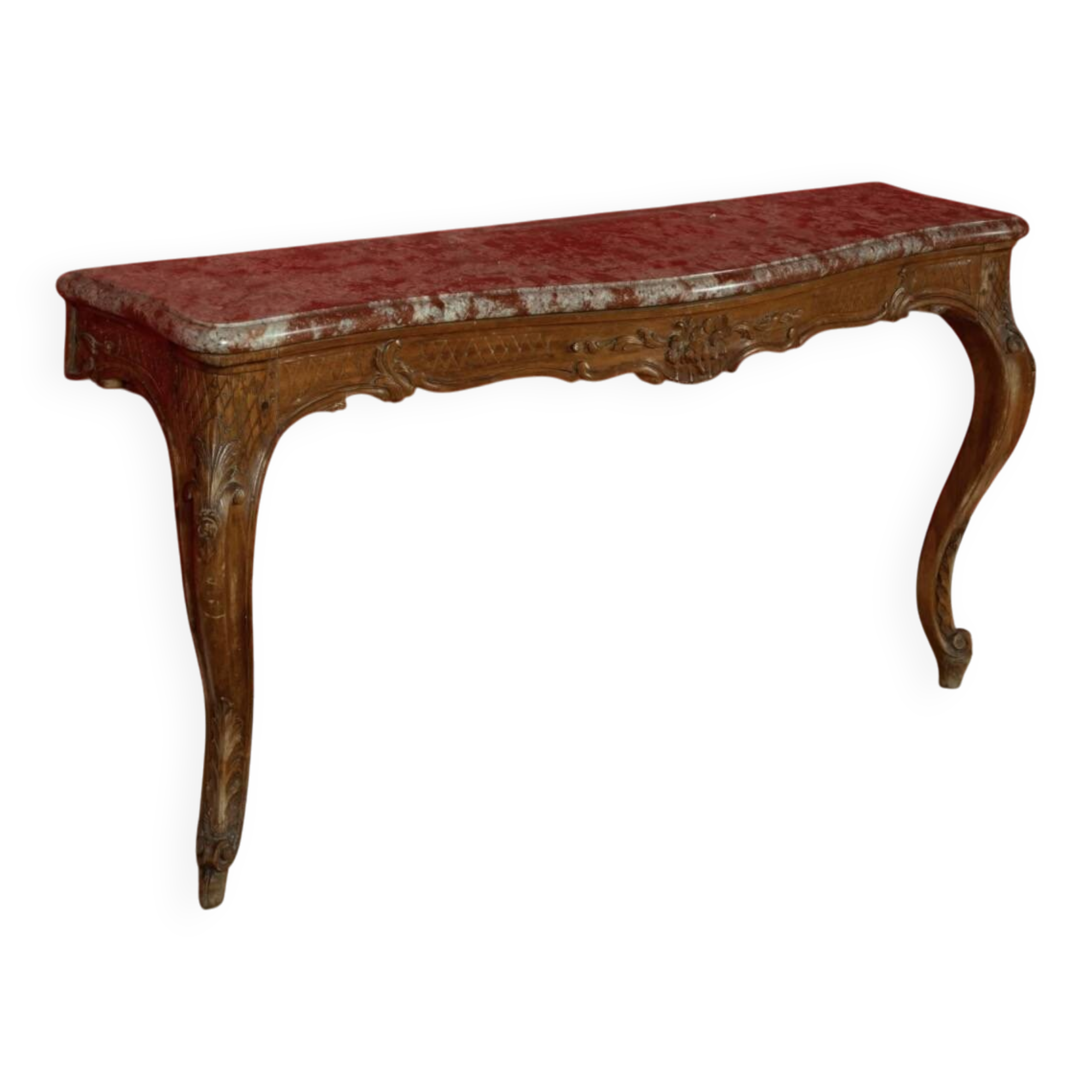 Important console in natural wood, moulded and carved with a red marble top.