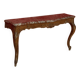 Important console in natural wood, moulded and carved with a red marble top.