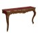 Important console in natural wood, moulded and carved with a red marble top.