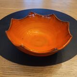 Orange ceramic star-shaped empty bowl