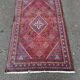 Authentic Persian carpet from Iran, hand-knotted in burgundy wool, 130x210cm.