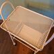 Perforated white metal serving trolley