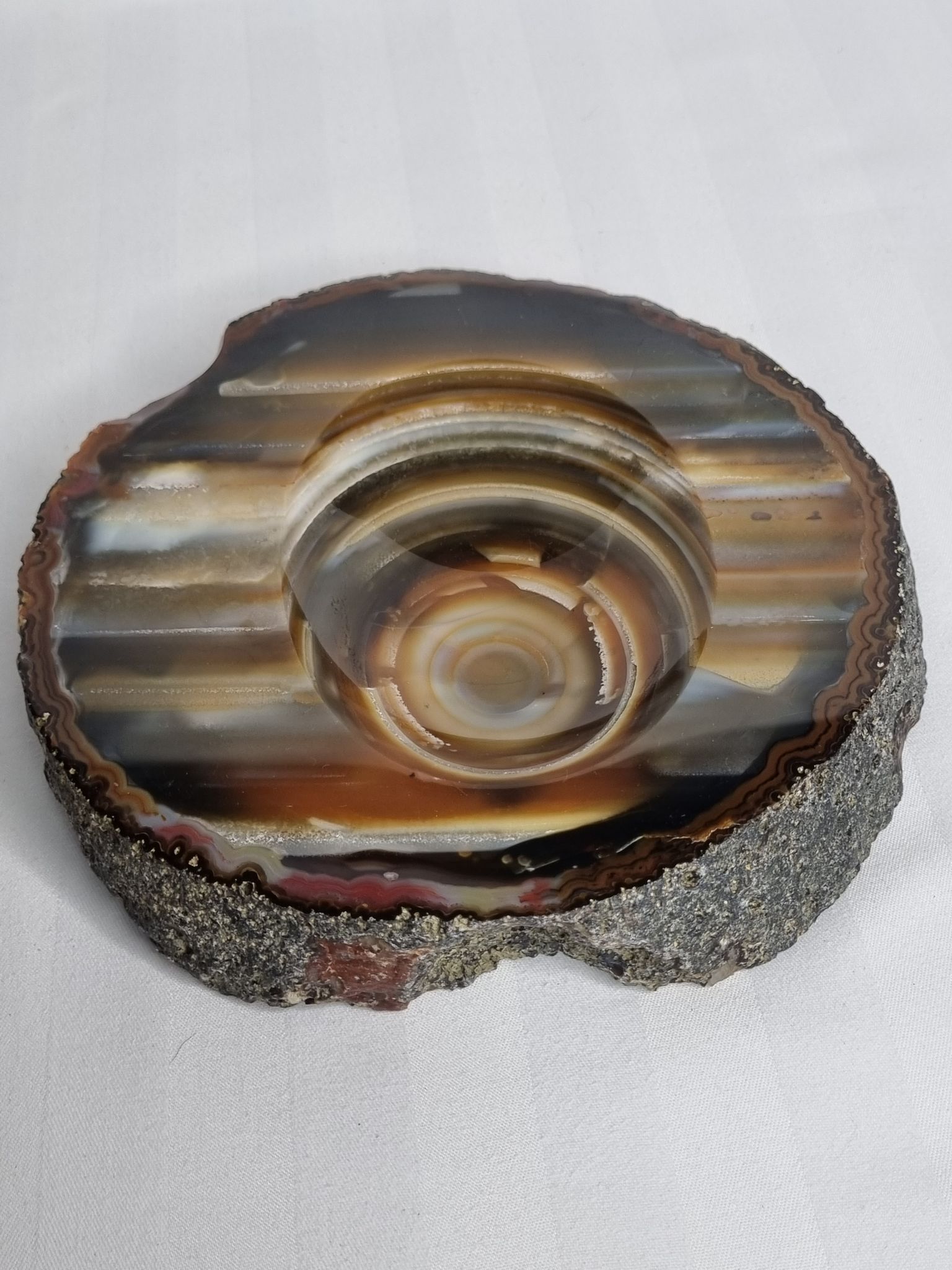 Empty pocket, slice of brown ochre agate