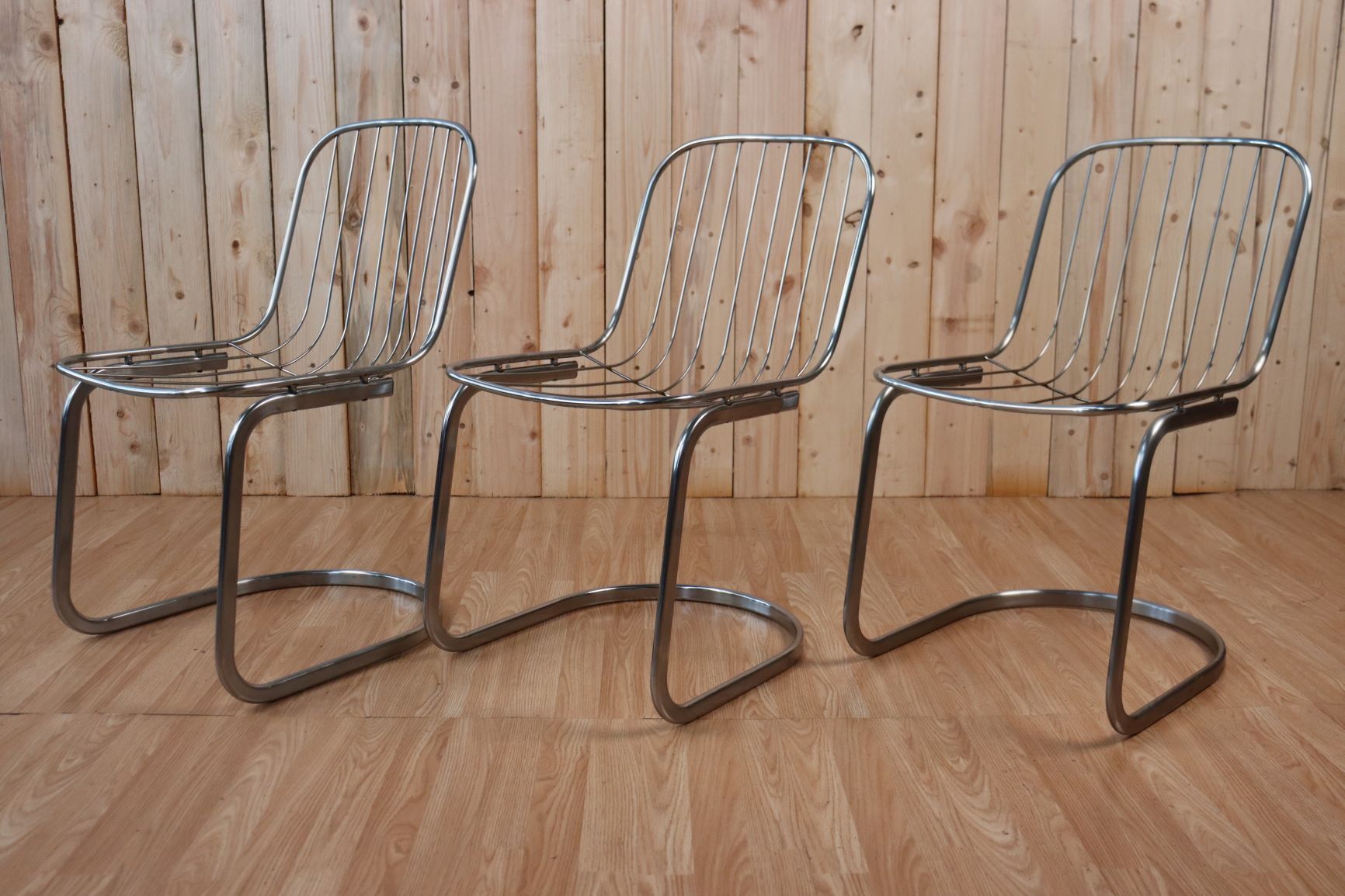 Series of 6 tubular steel chairs