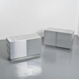 Pair of low buffets in brushed metal, French work, 1970s.