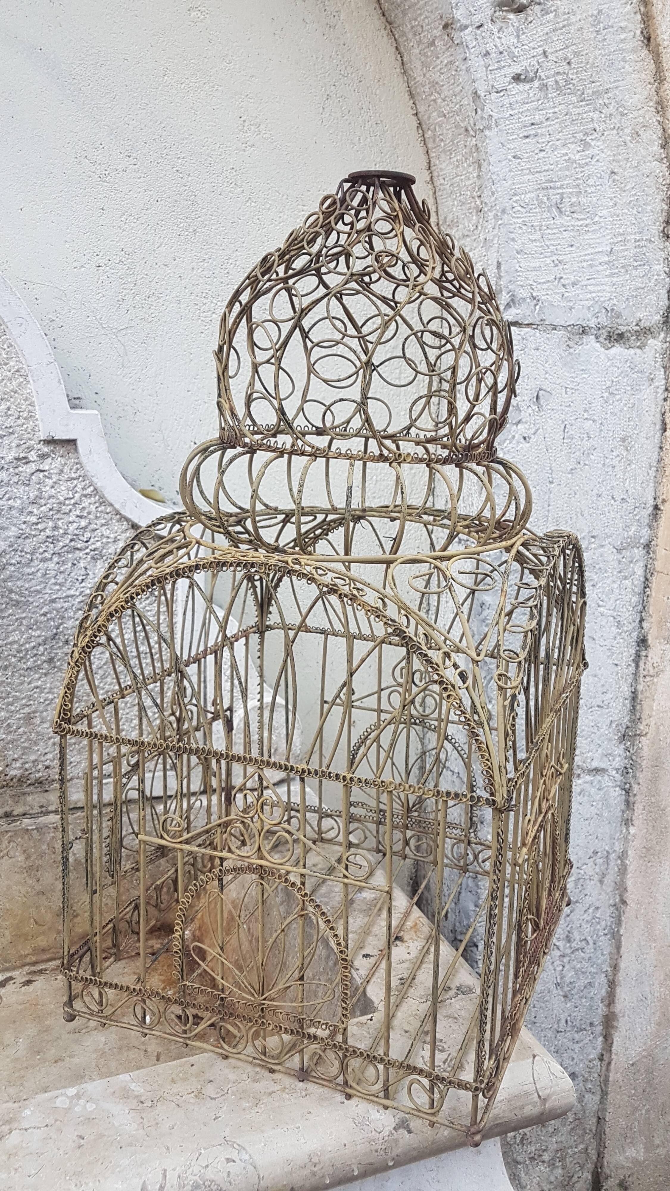 Painted old-bird cage in scrap
