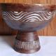 Cup on a pedestal in handcrafted scarified ceramic.