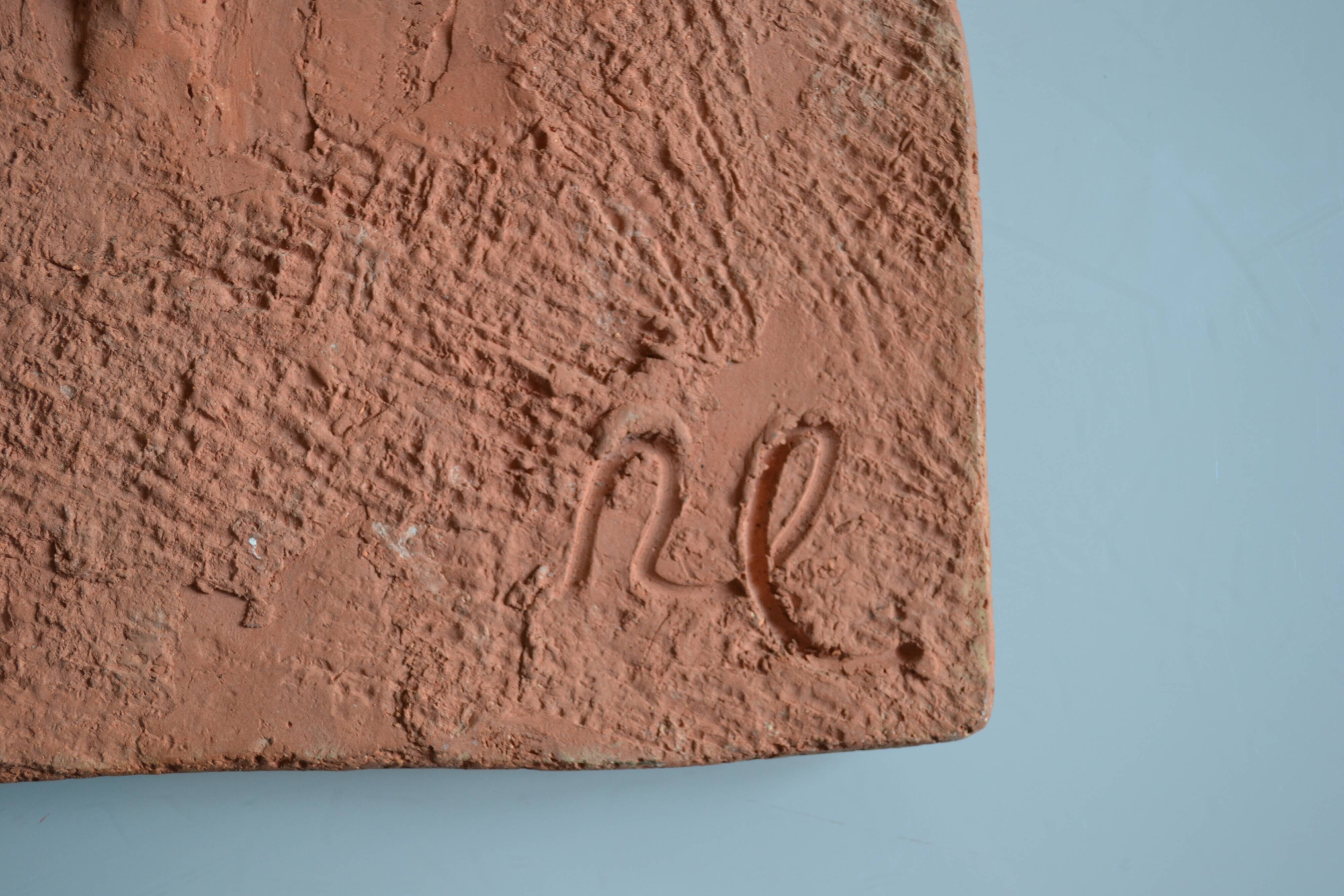 Bas-relief sculpture in terracotta inspired by the Celtic bestiary