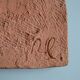Bas-relief sculpture in terracotta inspired by the Celtic bestiary