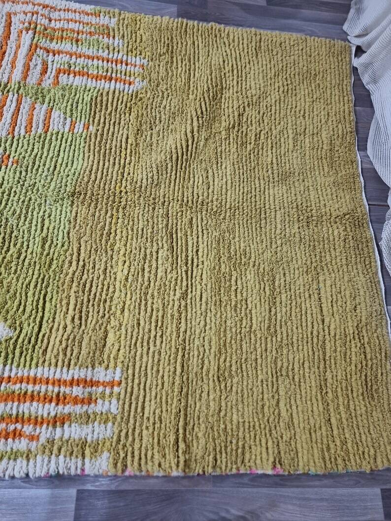 Handmade natural wool rug with colourful patterns, size 140/260 cm.