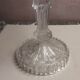 Old push-up in moulded thick glass