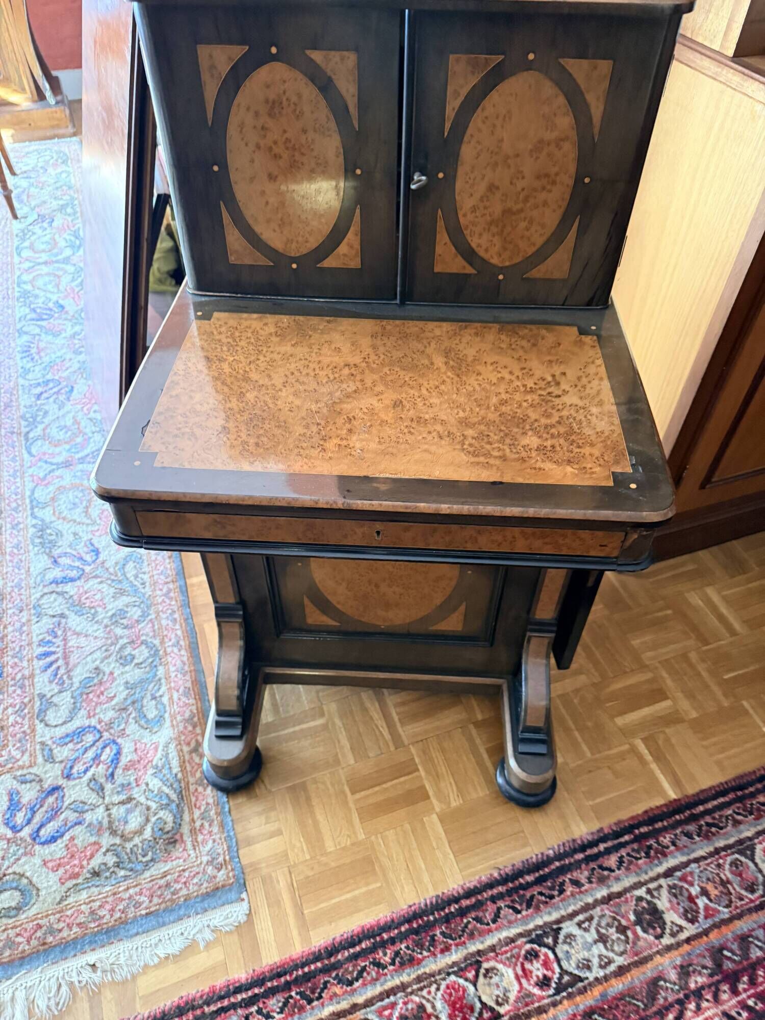 Victorian-era blackened wood and burr walnut Davenport.