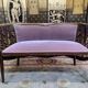 Living room with bench and two english armchairs in pink velvet