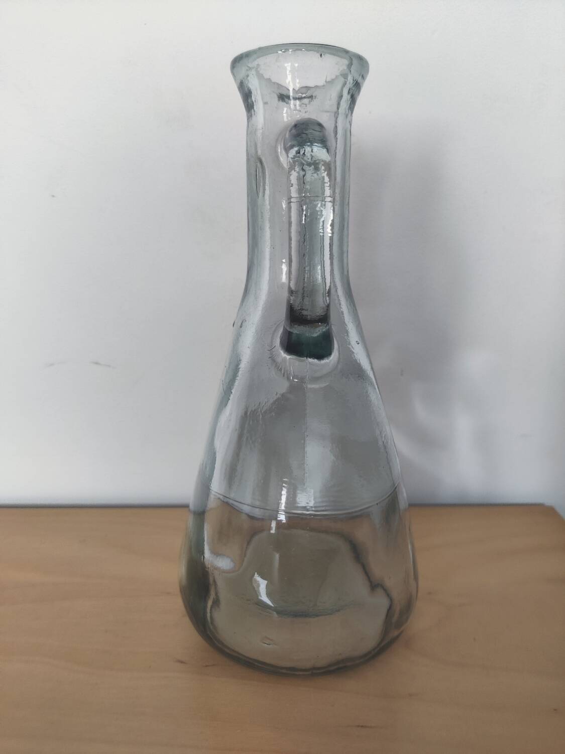 Antique carafe made of thick glass