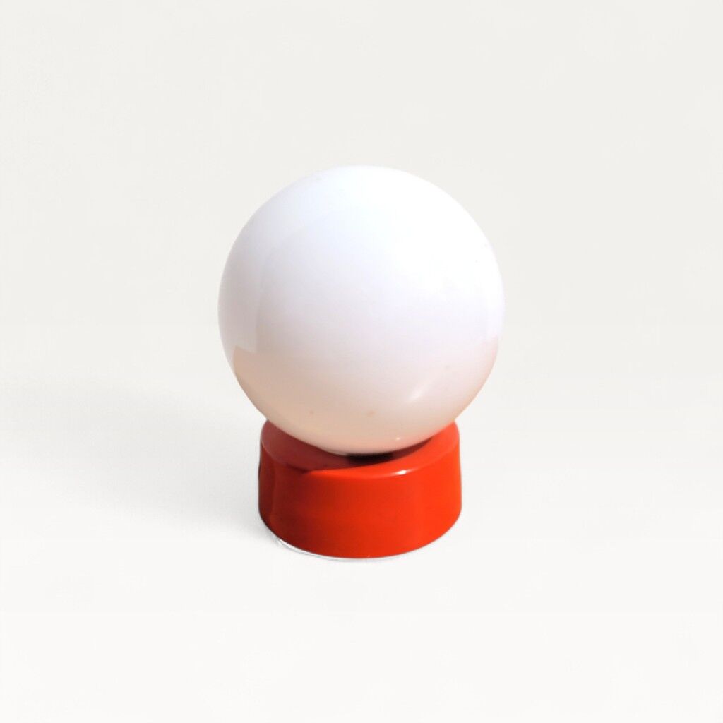 Small vintage opaline ball lamp with an orange base.