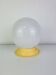 Art Deco opaline globe wall or ceiling light, yellow base