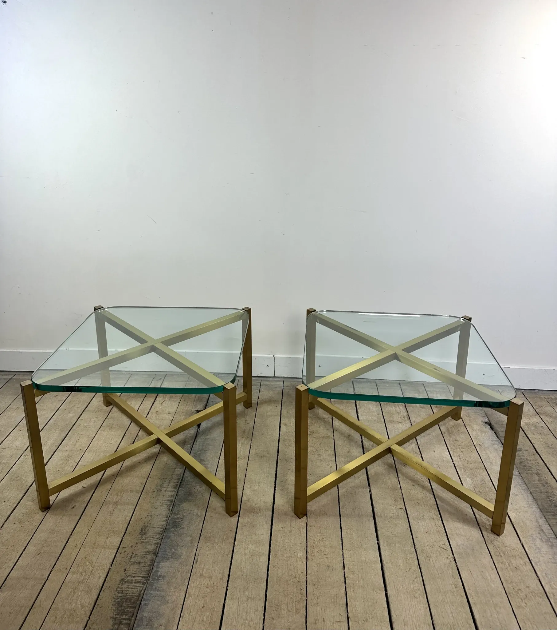Pair of Italian brass and glass side tables from the 1970s.