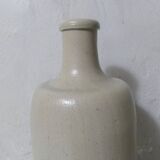 old beige stoneware bottle