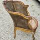 Gilded wood armchair and double canning