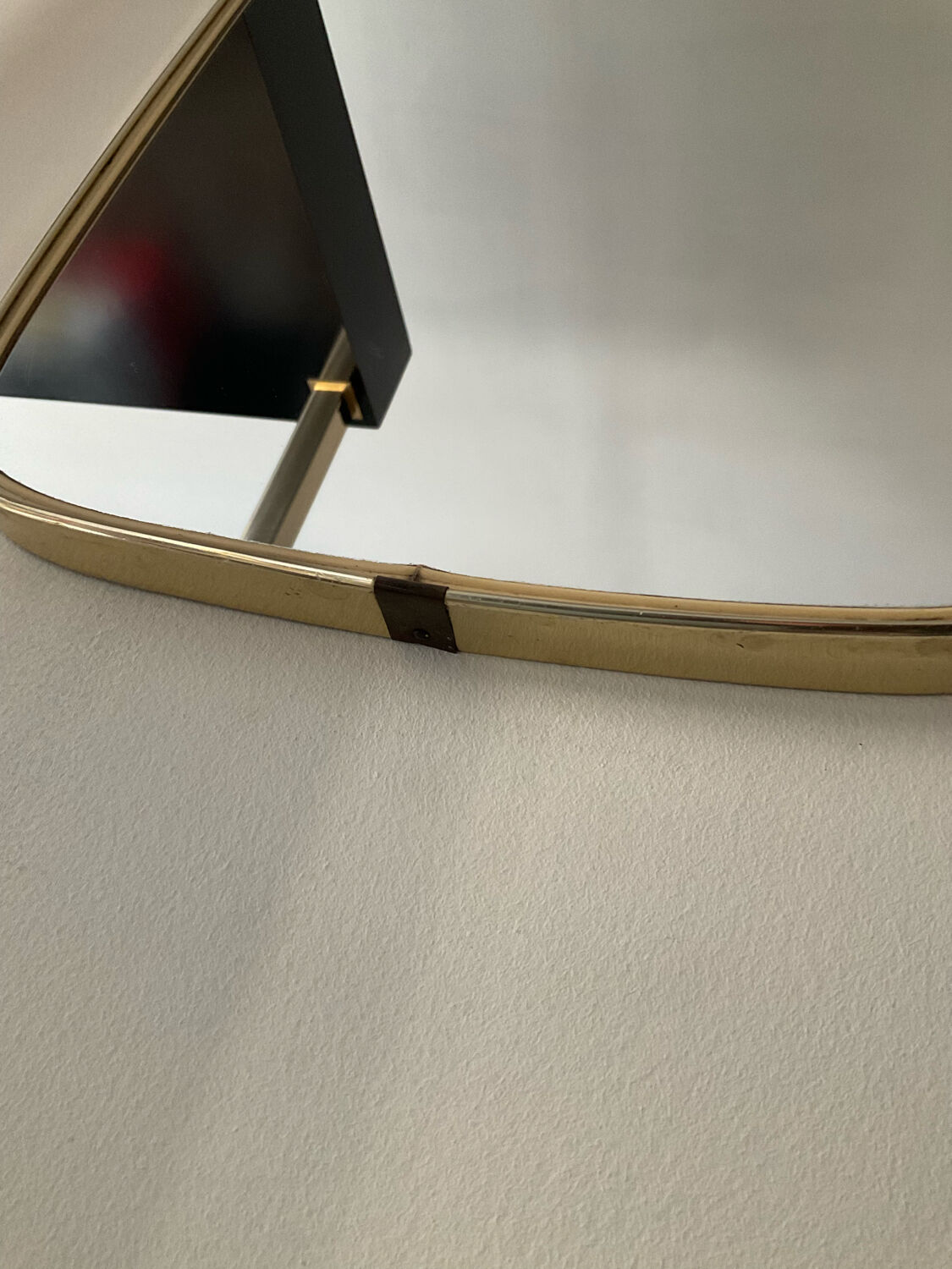 Asymmetrical free-form mirror from the 60s