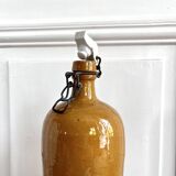 Bouteille ancienne en grès vernissé et bouchon en faÏence