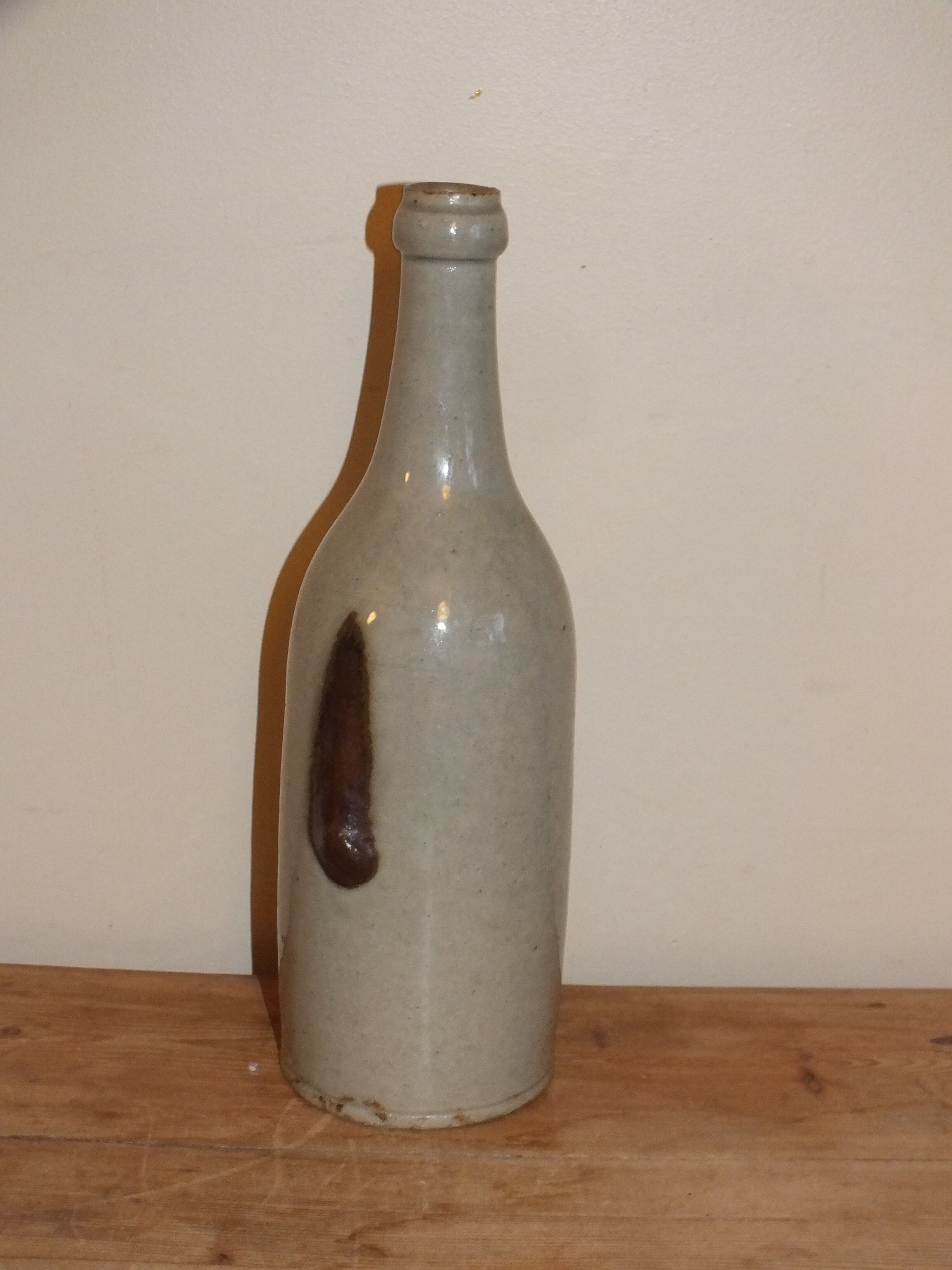 Old bottle in glazed clay of Saône et Loire