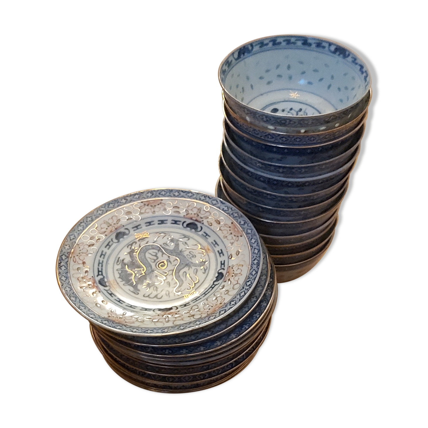 Service of 12 bowls and 12 under dishes in Chinese porcelain called rice seed of the 1960s