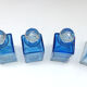 Set of 5 sapphire blue Bohemian crystal toilet bottles.
