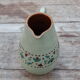 Vernified sandstone pitcher
