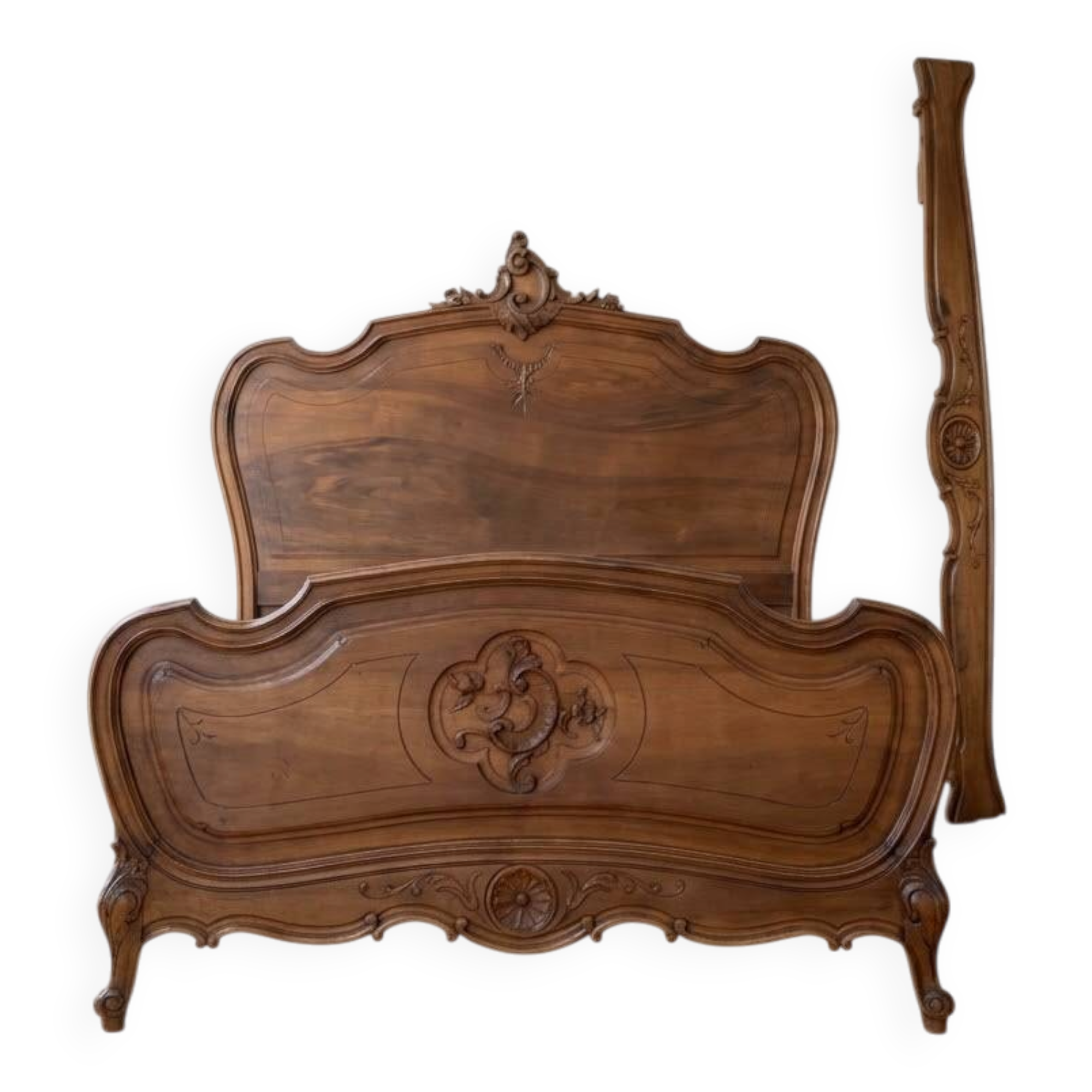 Double bed in carved wood, Louis XV style.