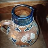 Ceramic pitcher/jug with Roger Guerin coat of arms.