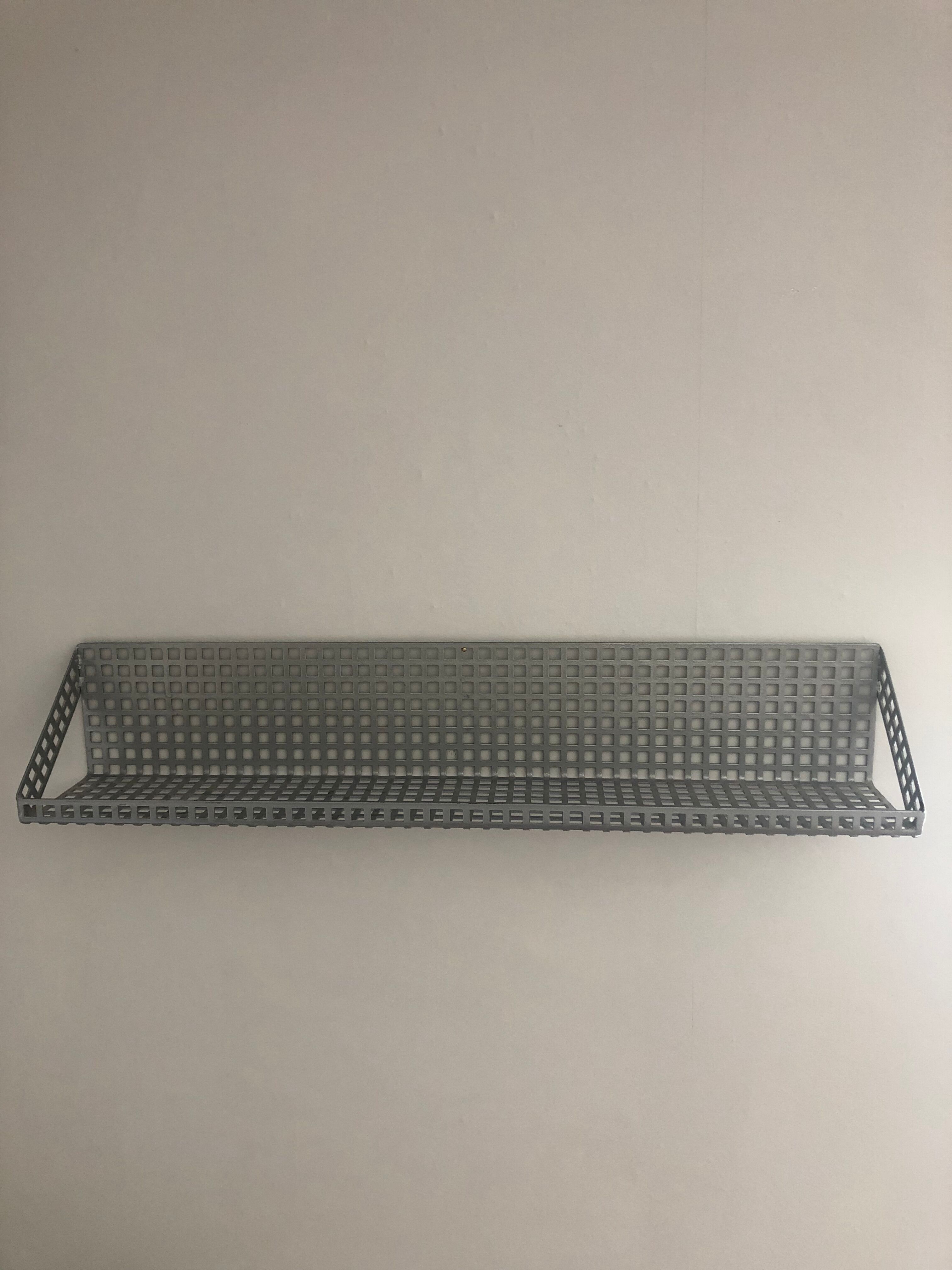 Vintage perforated sheet metal shelf