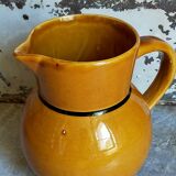 Yellow Provencal ceramic water pitcher with black net