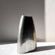 Vintage brushed aluminium vase with green stripes.