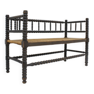 Vintage bobbin bench with rush seat 1920s