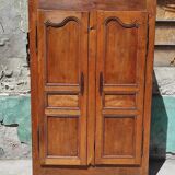 Old rustic oak cabinet of the 19th century louis 15 style