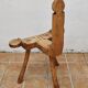 Brutalist chair in solid wood, European handcrafted work from the early 20th century.