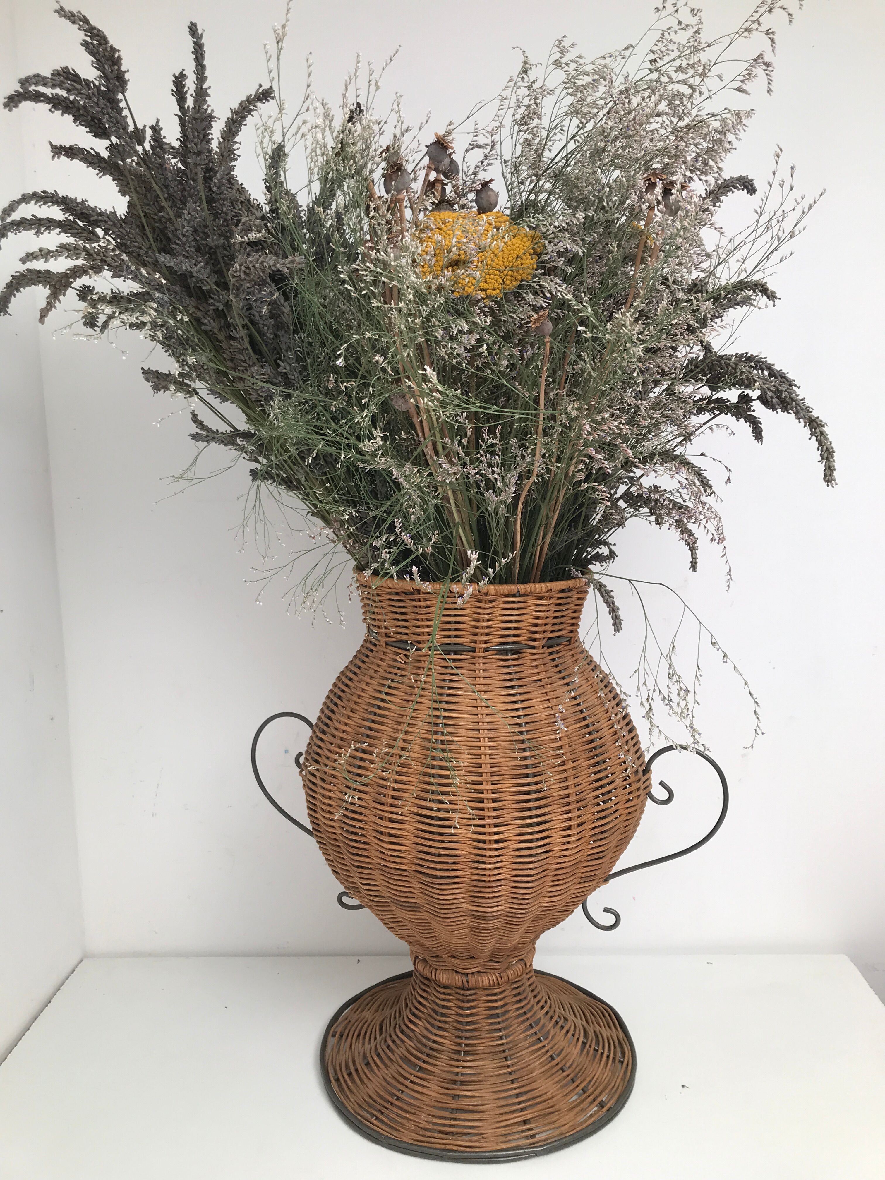Vintage wrought iron wicker plant holder