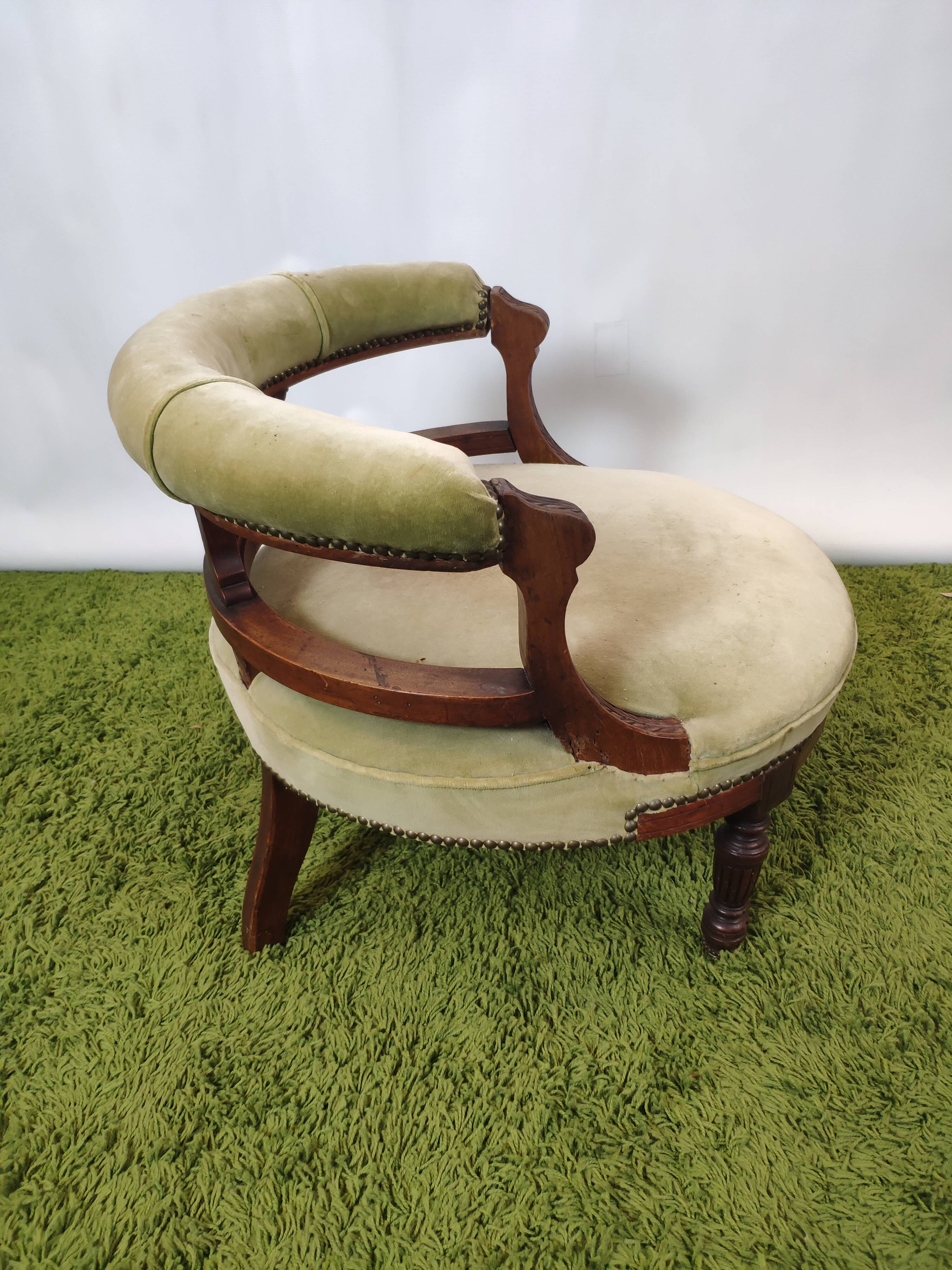 Old green velvet empire chair