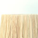 White and blue ceramic lamp, raffia shade