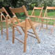 Série de 4 chaises pliantes en hêtre massif