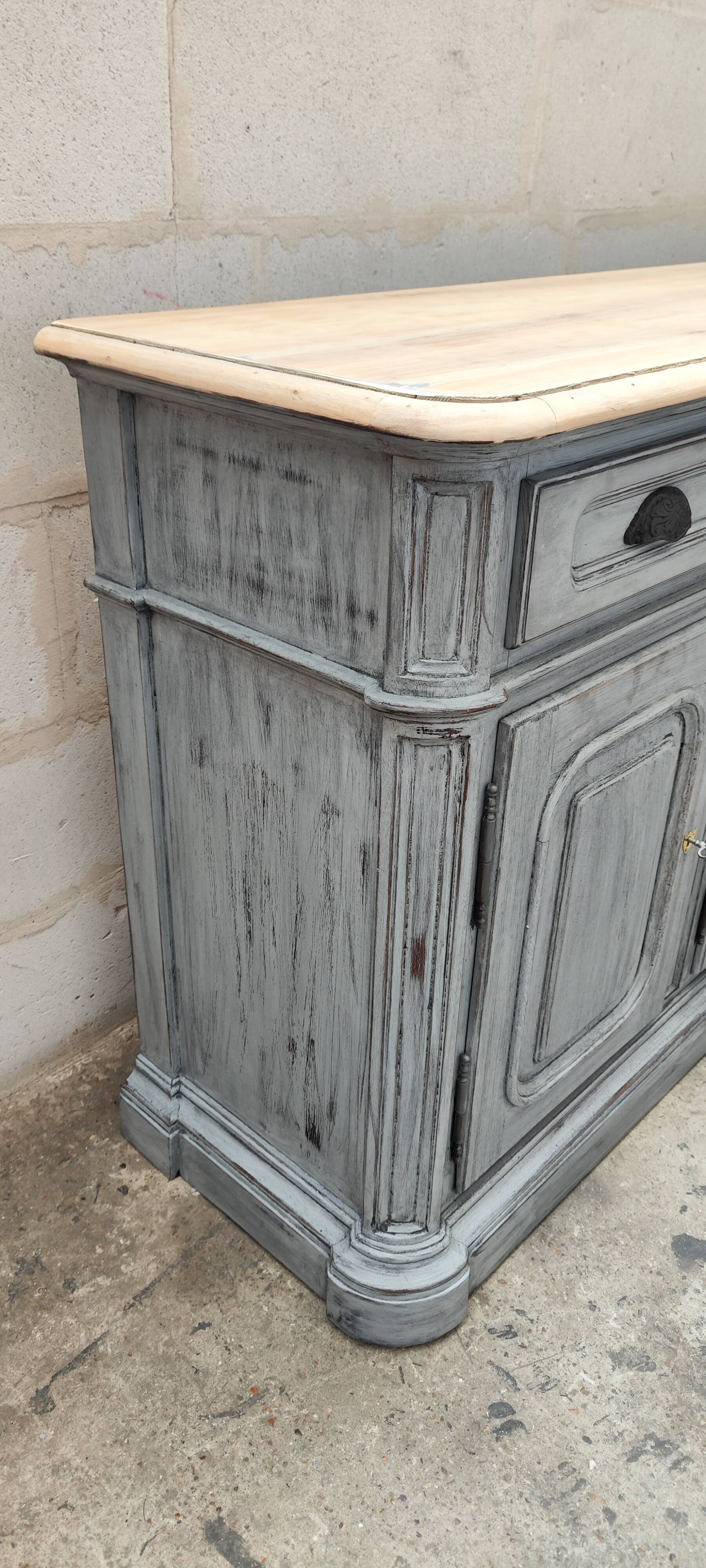 Grey patina furniture with three doors and three drawers
