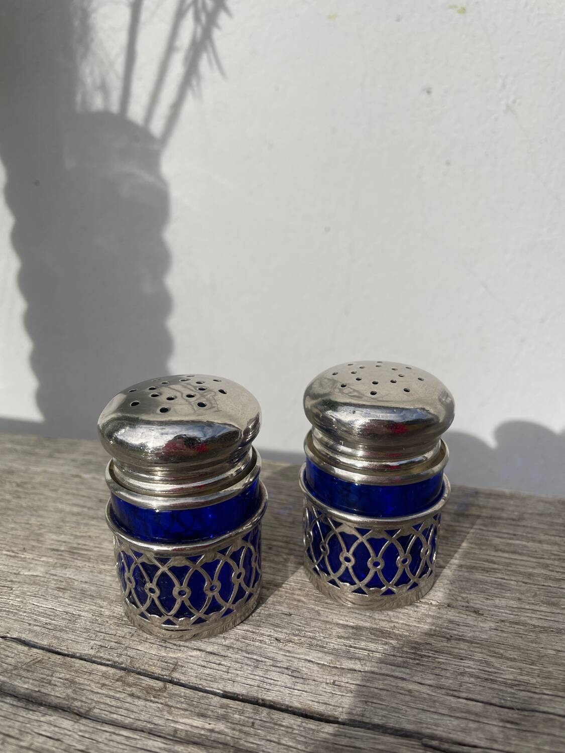 Silver-plated metal and blue glass salt and pepper shaker
