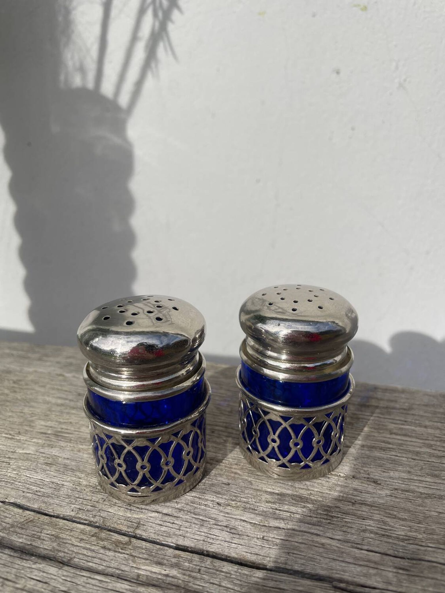 Silver-plated metal and blue glass salt and pepper shaker