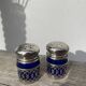 Silver-plated metal and blue glass salt and pepper shaker