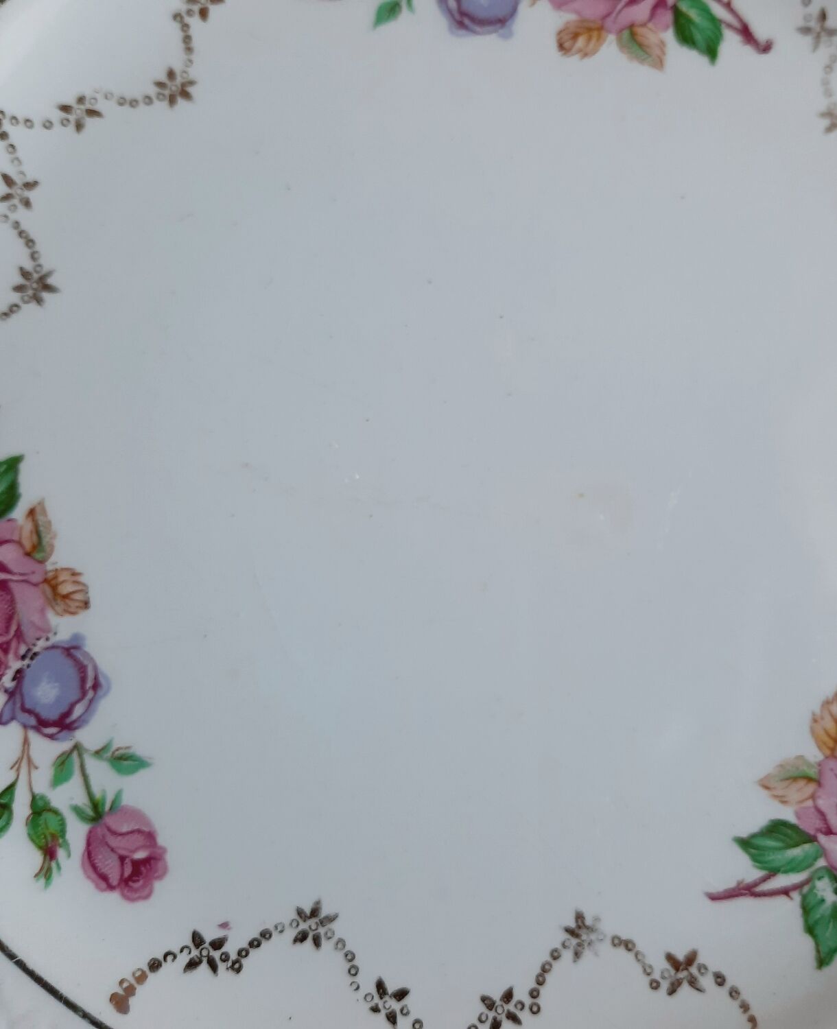 Antique dessert plates mismatched in earthenware with gilded edges